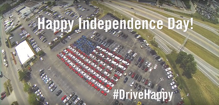 Auto Dealer Makes Supersize Flag with Cars to Celebrate US Independence Day
