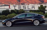 Tesla Hands Over First Model 3 to Customers